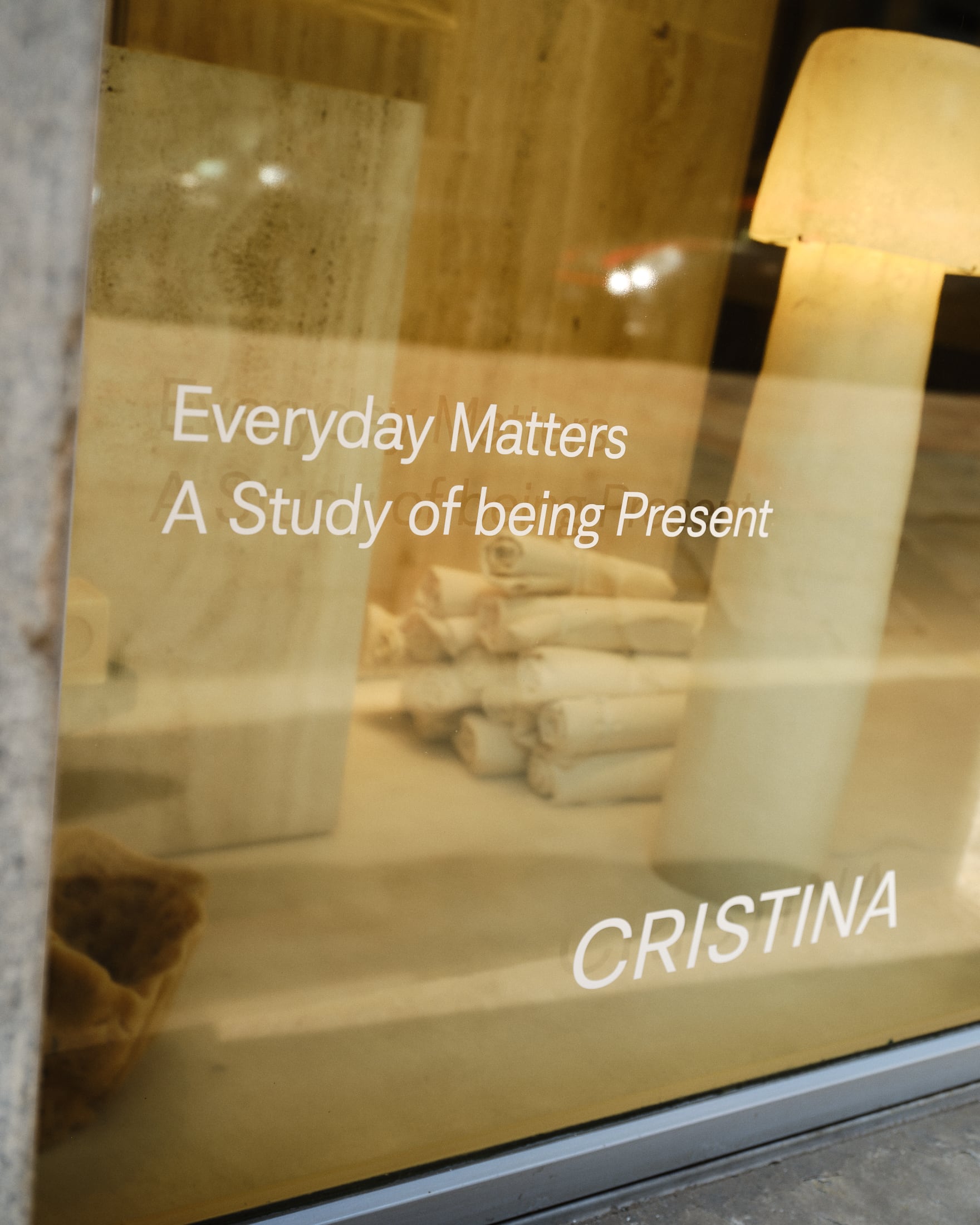 A windowfront at the CRISTINA showroom in Brera, Milan
