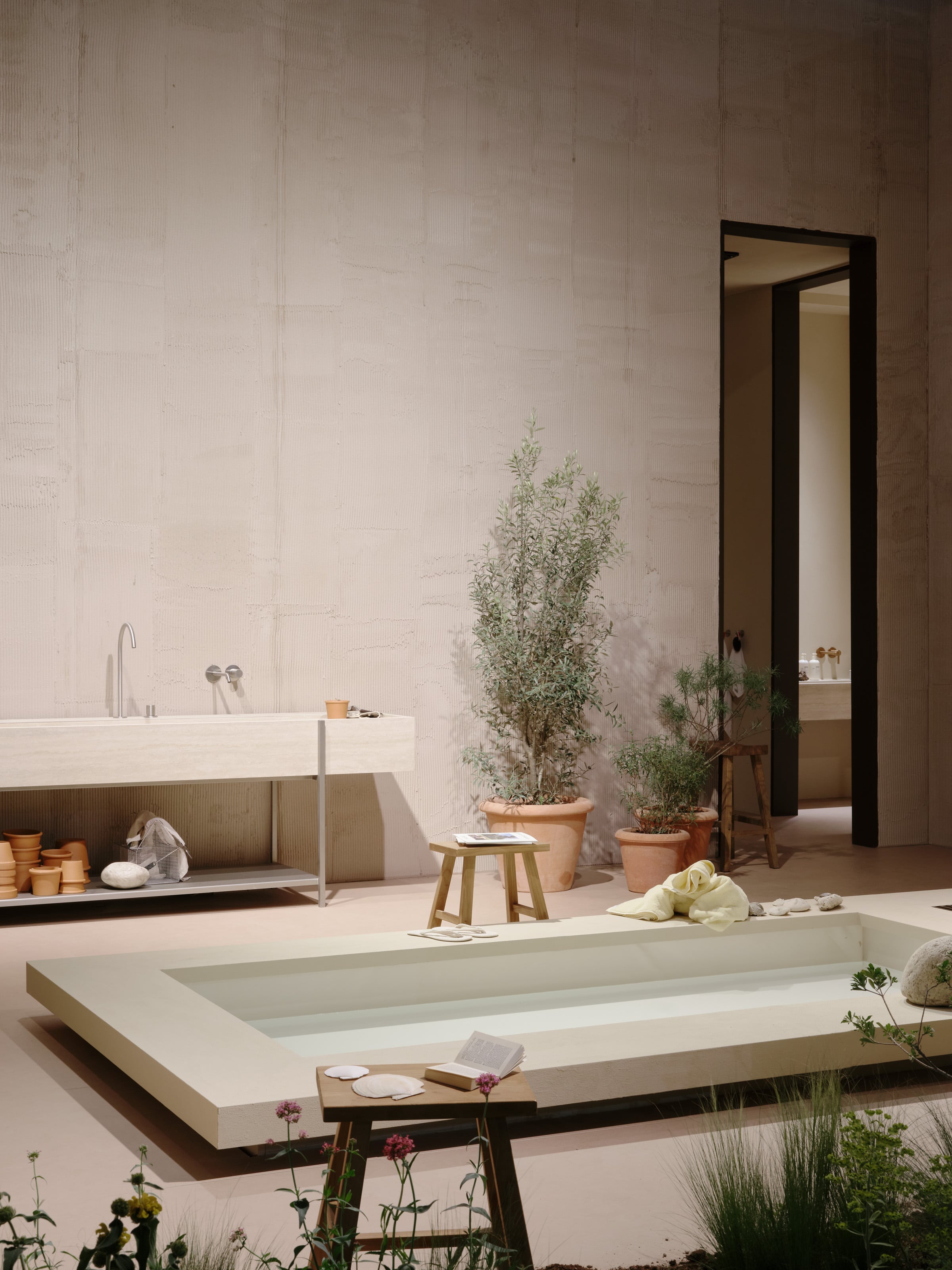 An outdoor pool situation styled at the CRISTINA Salone del Mobile fair stand