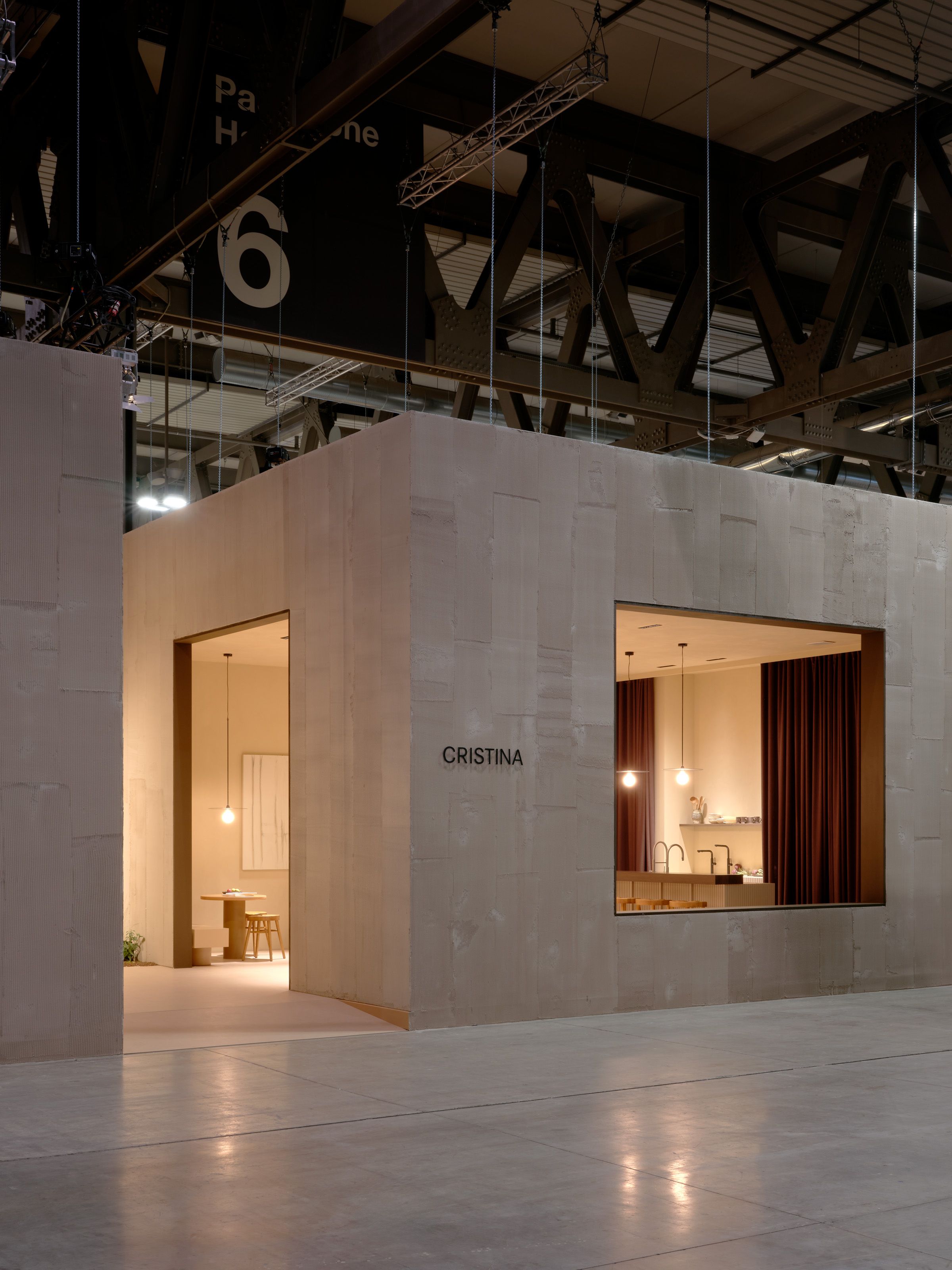 The perfectly lit CRISTINA fair stand at Salone del Mobile