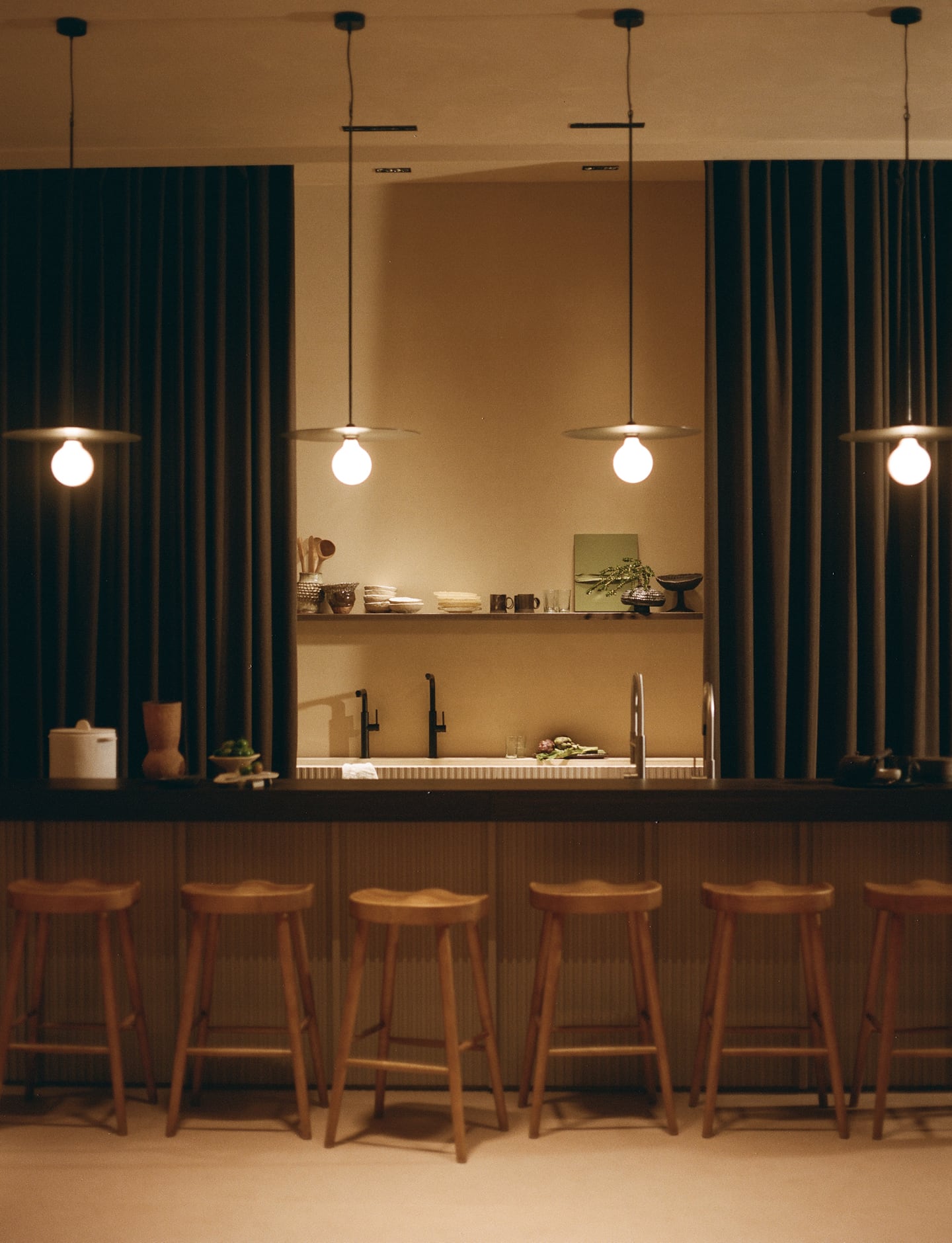 A warmly lit inviting kitching counter